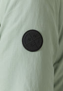 Black mnt patch on boys parka jacket sage green fabric