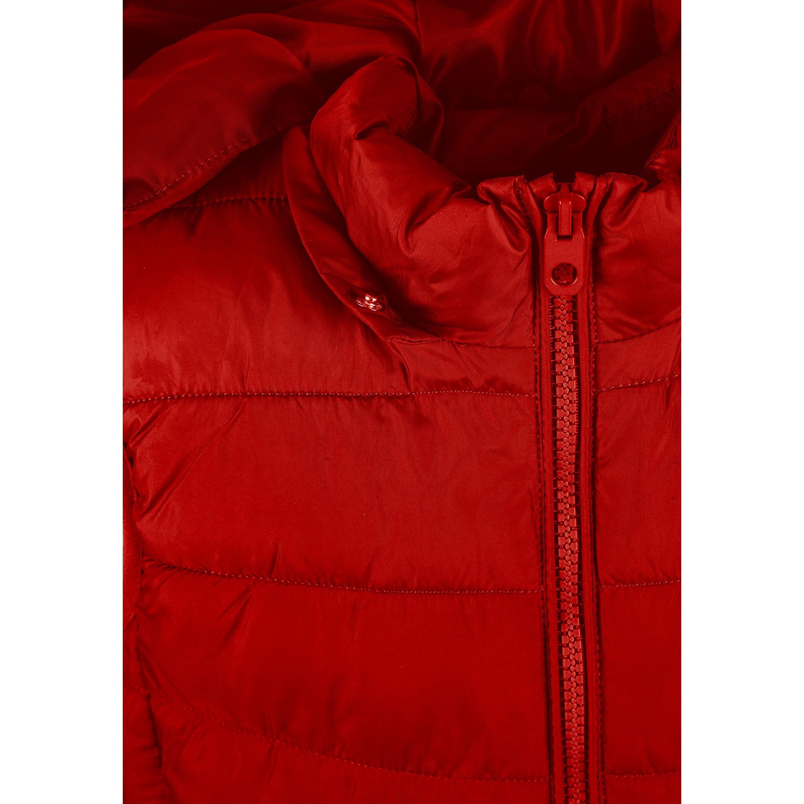 Close-up detail of red padded gilet showing quilted texture, zip fastener and gathered hood construction