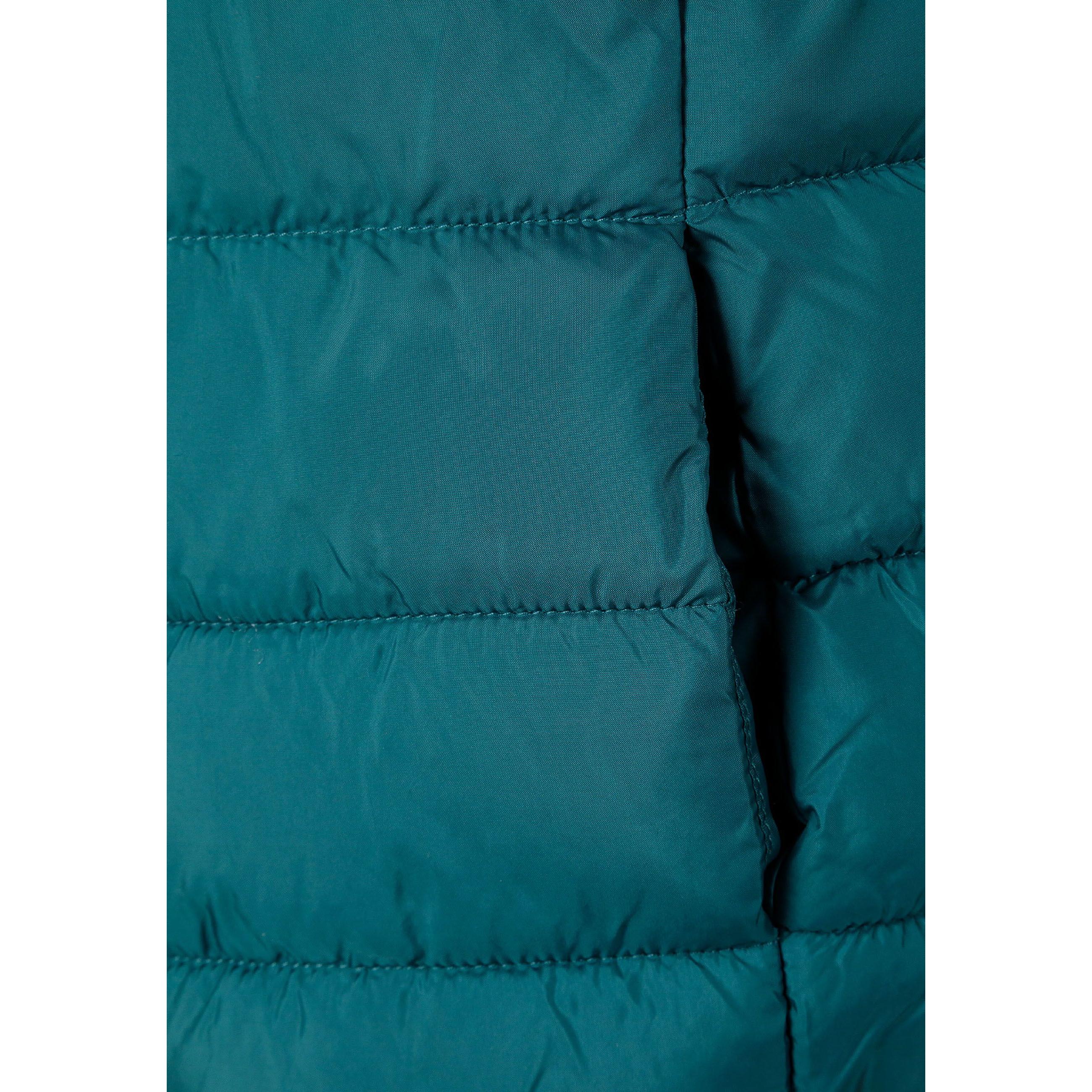 Close-up detail of green quilted fabric showing padded construction and stitching pattern in teal green shade