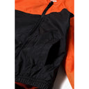 Boys orange and black hooded windbreaker coat with front zip, elastic cuffs, and side pocket.