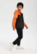 Boys windbreaker coat in bright orange and black two-tone with hood and striped sleeve panel