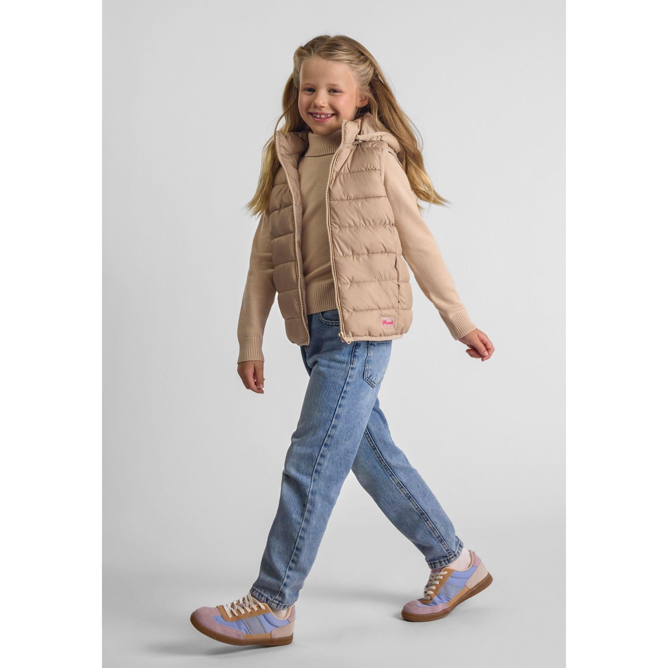 Flat lay of beige quilted gilet showing horizontal quilting pattern and overall silhouette on white background