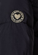 Girls black quilted hooded puffer coat with navy embroidered gold heart patch