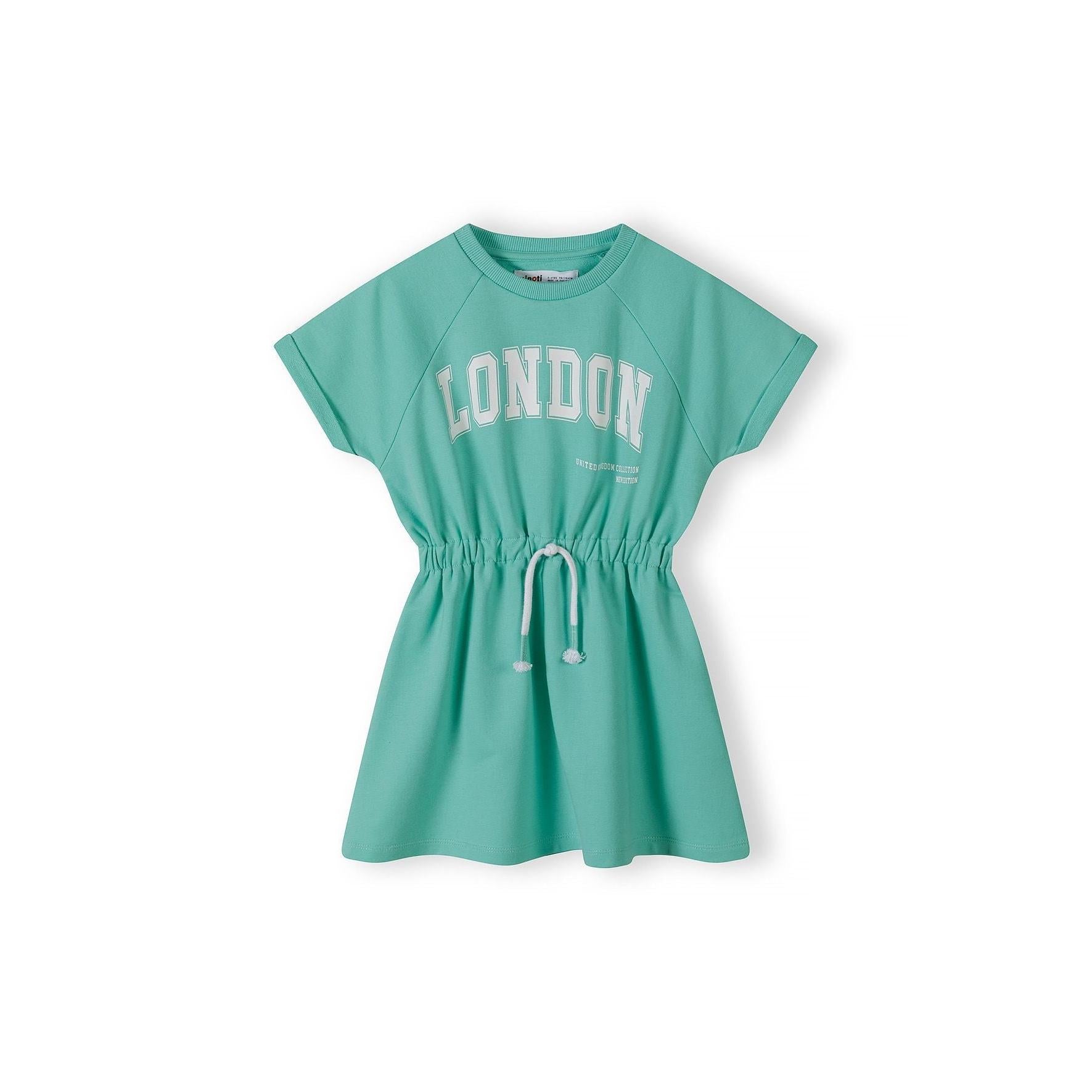 Green fleece dress with London print displayed flat against white background, showing oversized silhouette and elasticated waist with drawstring