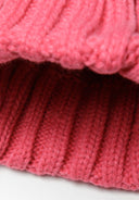 Vibrant pink girls knitted cable beanie with fluffy pom pom