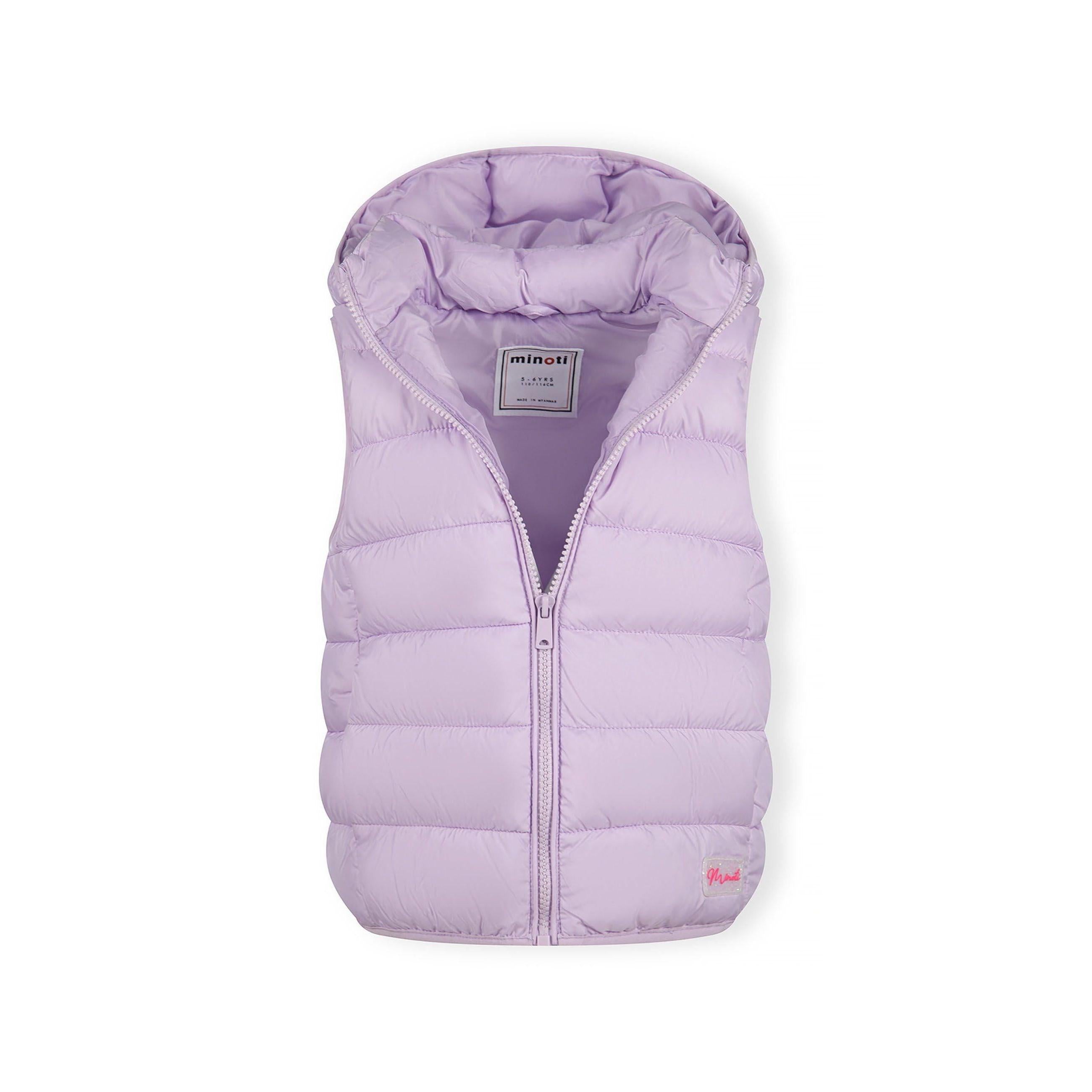 Close-up detail of lilac quilted fabric texture showing stitching pattern and Minoti brand label with glitter finish