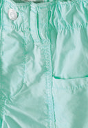Girls poplin shorts in mint green cotton with silver button and stitched seams