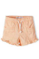 Girls poplin shorts in peach with ruffled hem and white drawstring