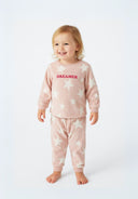 Girls pyjama set cuddle fleece raglan sleeve pink 9m-8y featuring soft pink fabric with star print and "DREAMER" text.  