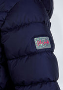 Girls quilted jacket in navy blue with detachable hood and Harrods pink patch