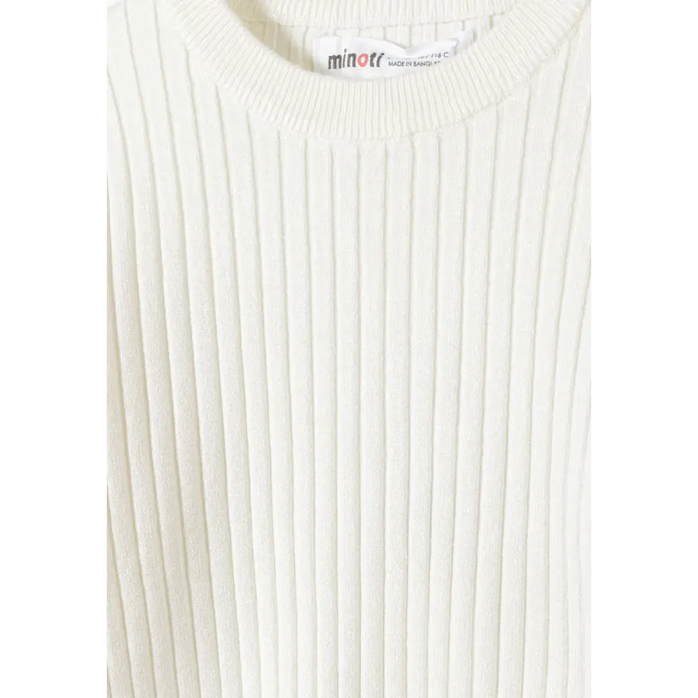 Close-up detail of white ribbed jumper showing Minoti brand label at neckline and vertical ribbed knit pattern