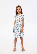 Girls summer dress in white with blue butterfly print, short sleeves, fluttery skirt