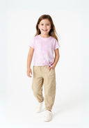 Child in pink knotted t-shirt with girls twill combat beige cargo pants