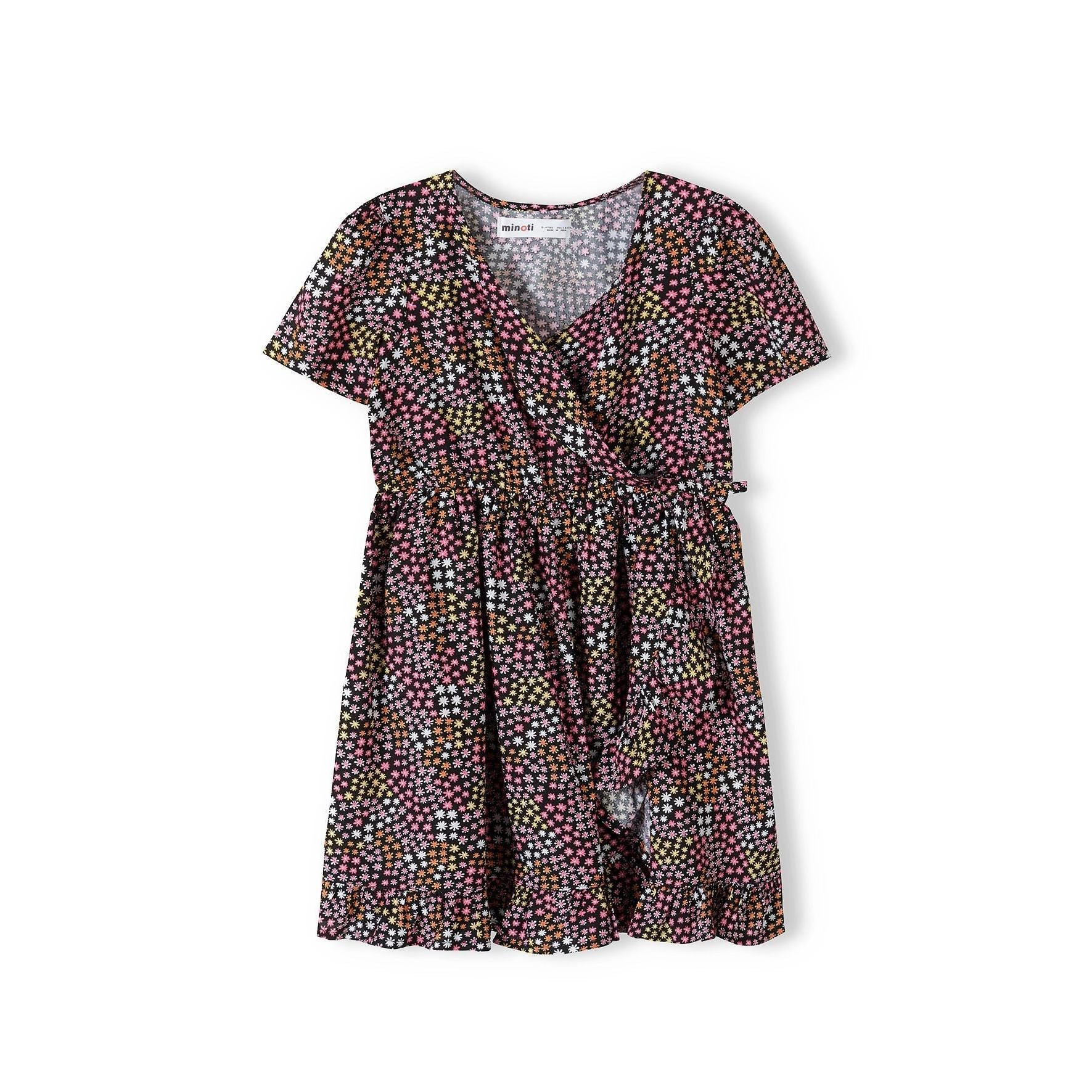Multicoloured star print wrap dress laid flat showing short sleeves, wrap front detail and gathered skirt with frill hem on white background