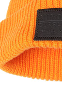 Bright orange ribbed knitted fisherman hat with Mino Surplus leather patch