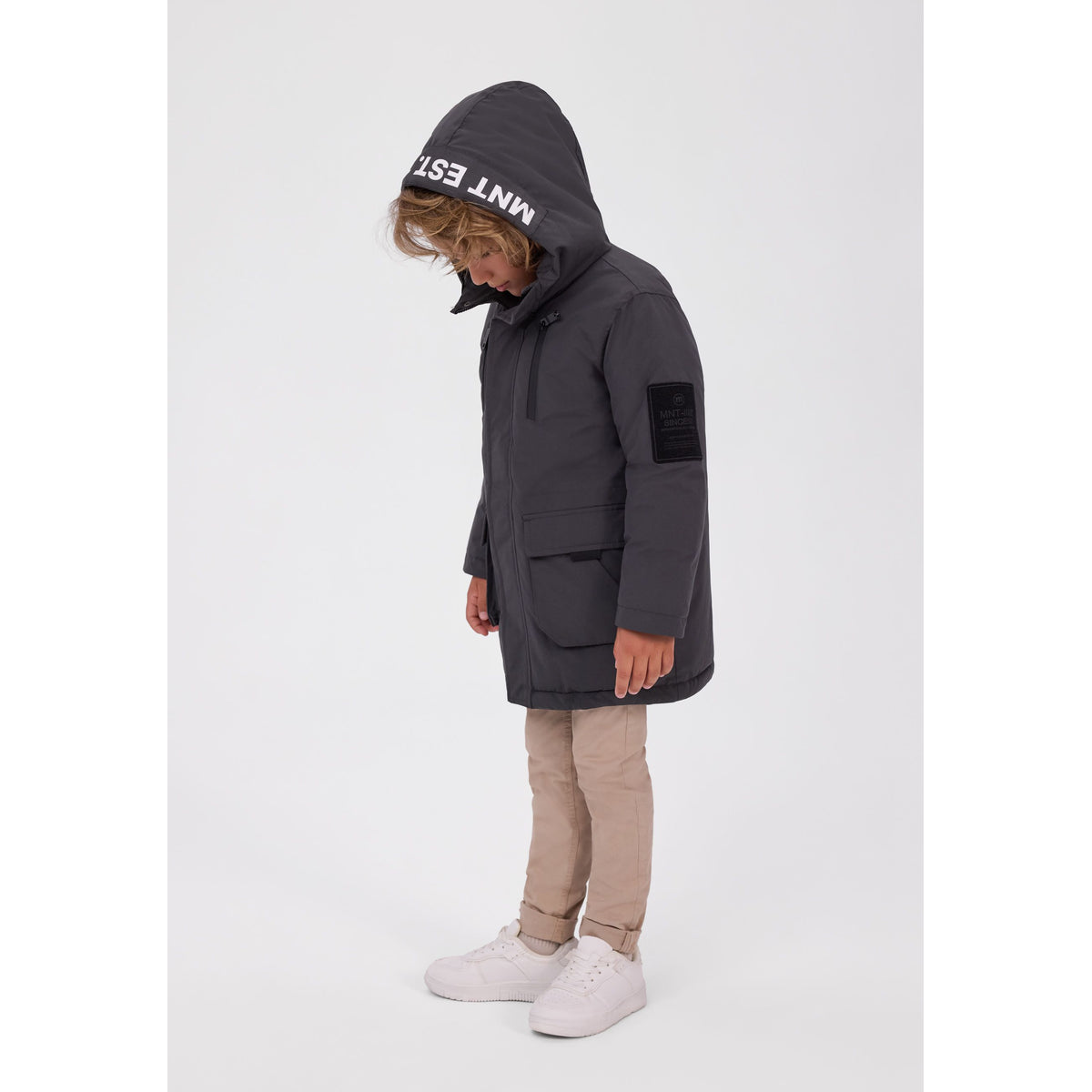 Hooded parka with slogan print in dark grey — full view on white square background
