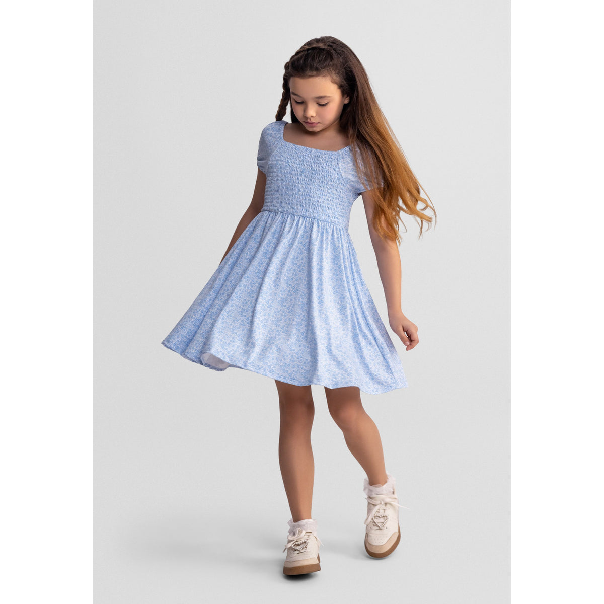 Girls' shirred floral dress in light blue and white — complete product view for square Shop card