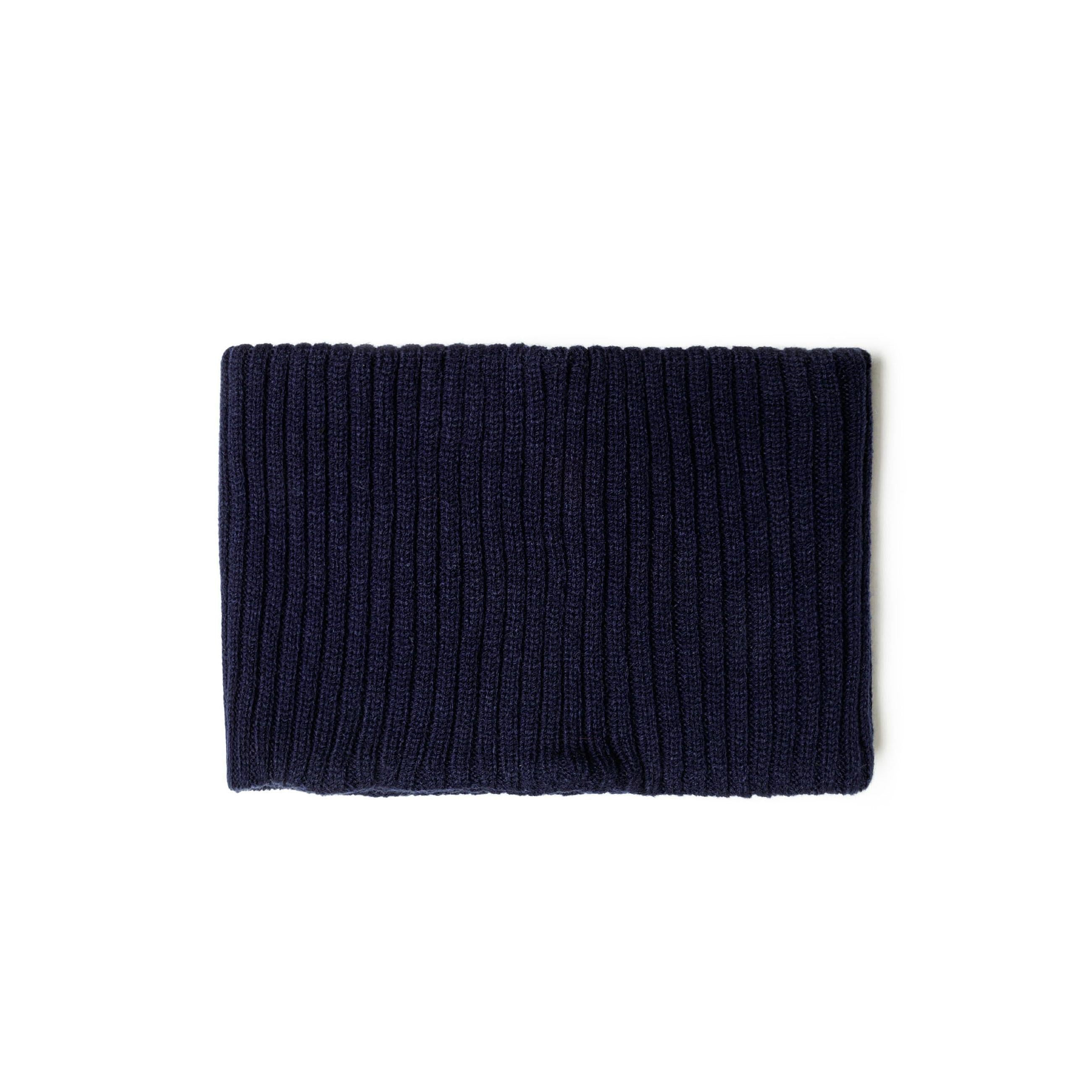 Detail view of navy ribbed knit texture and construction of the winter accessories
