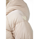 Beige padded winter jacket with quilted design and heart patch